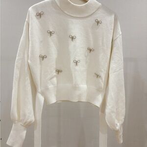White Sweater with Diamond Bow Accents